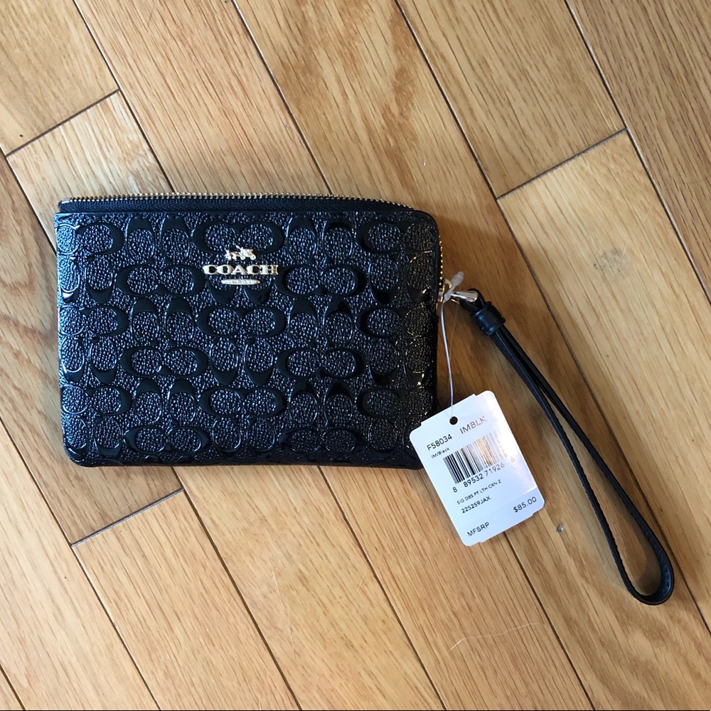 Coach black embossed patent leather wristlet